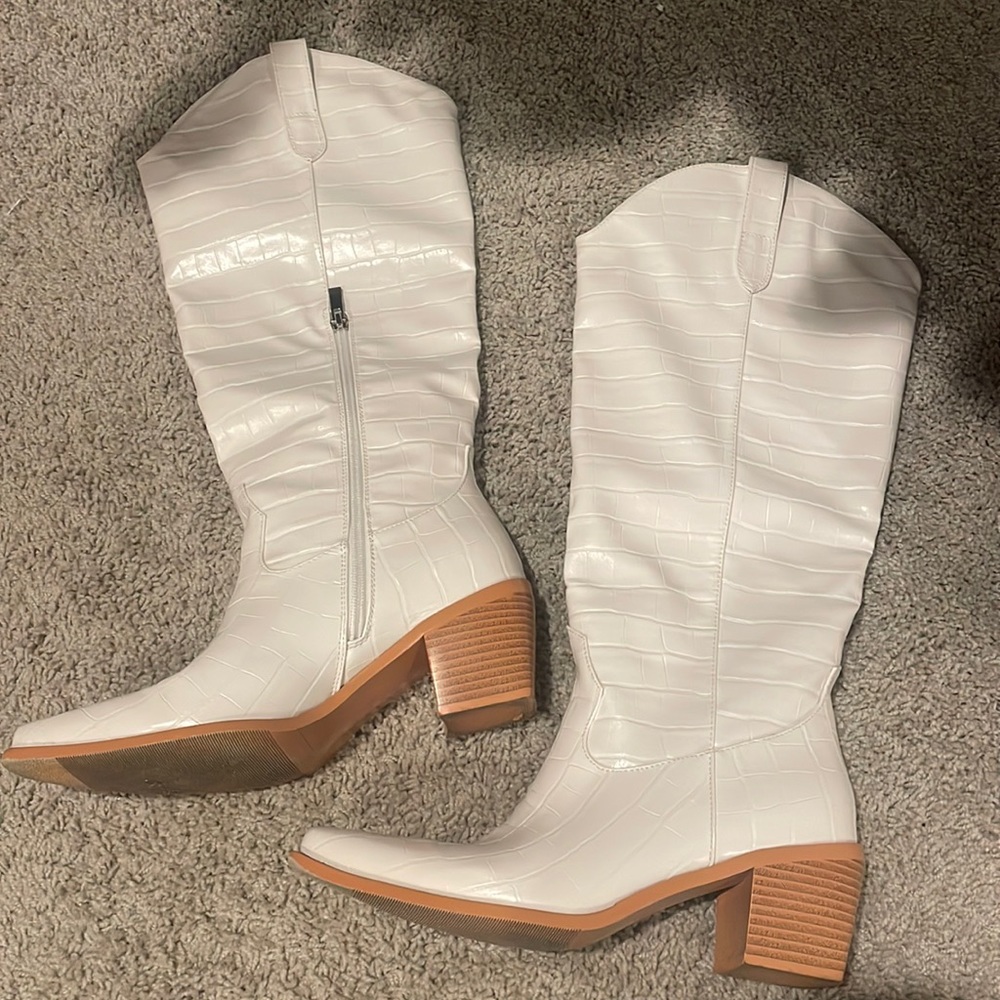 Tall white cowboy boots, size 7.5.